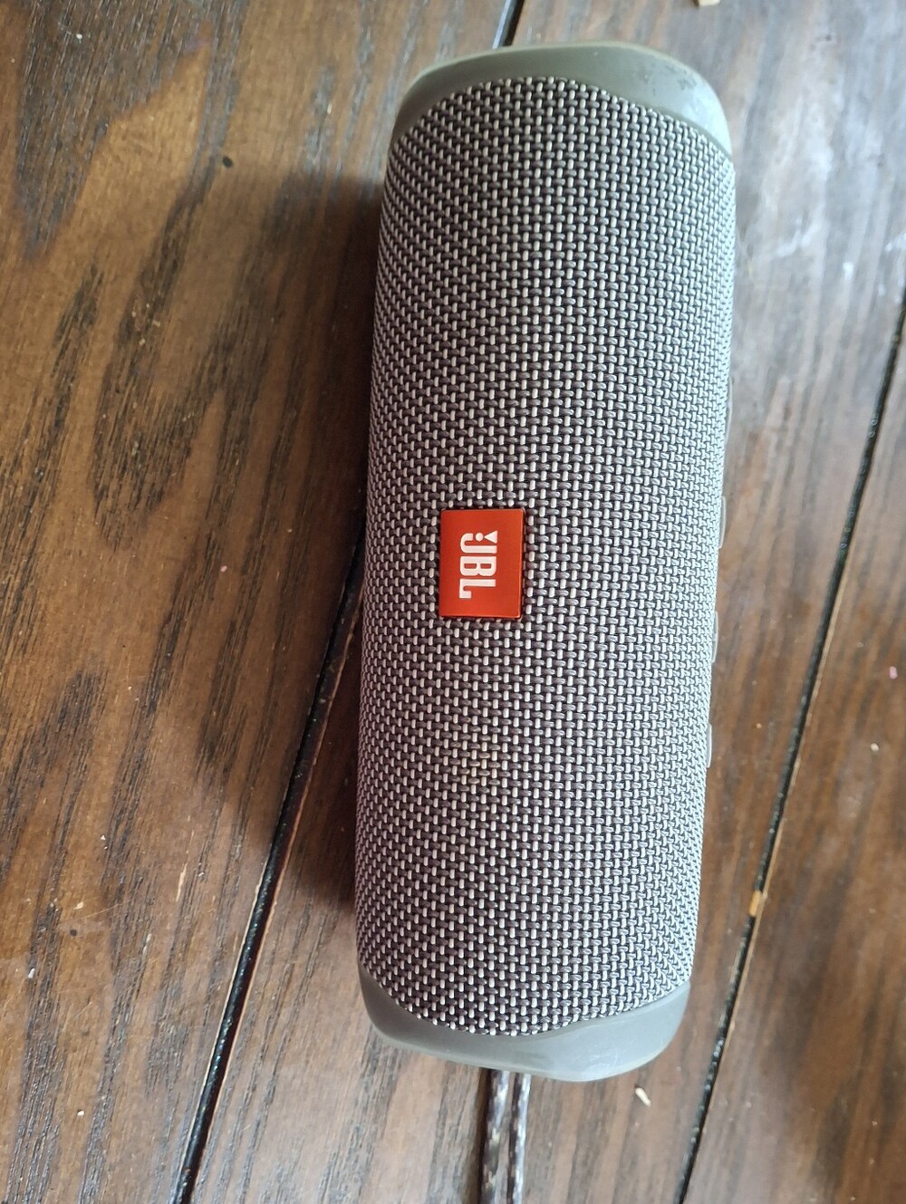 JBL Portable Bluetooth Speaker in Gray with Orange Logo